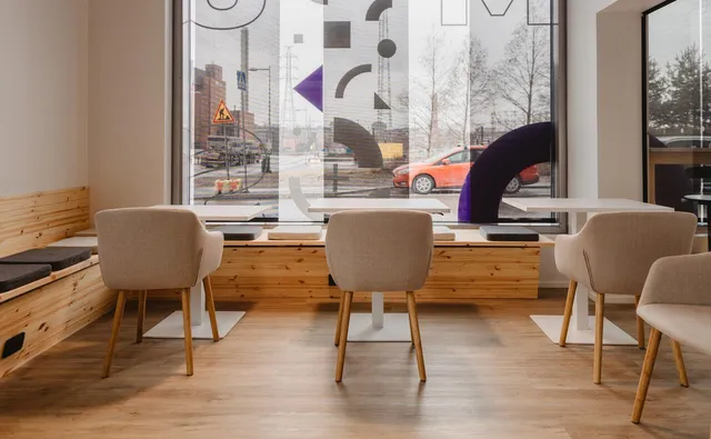Window seats with Innovation Hub graphics at M8S Hub